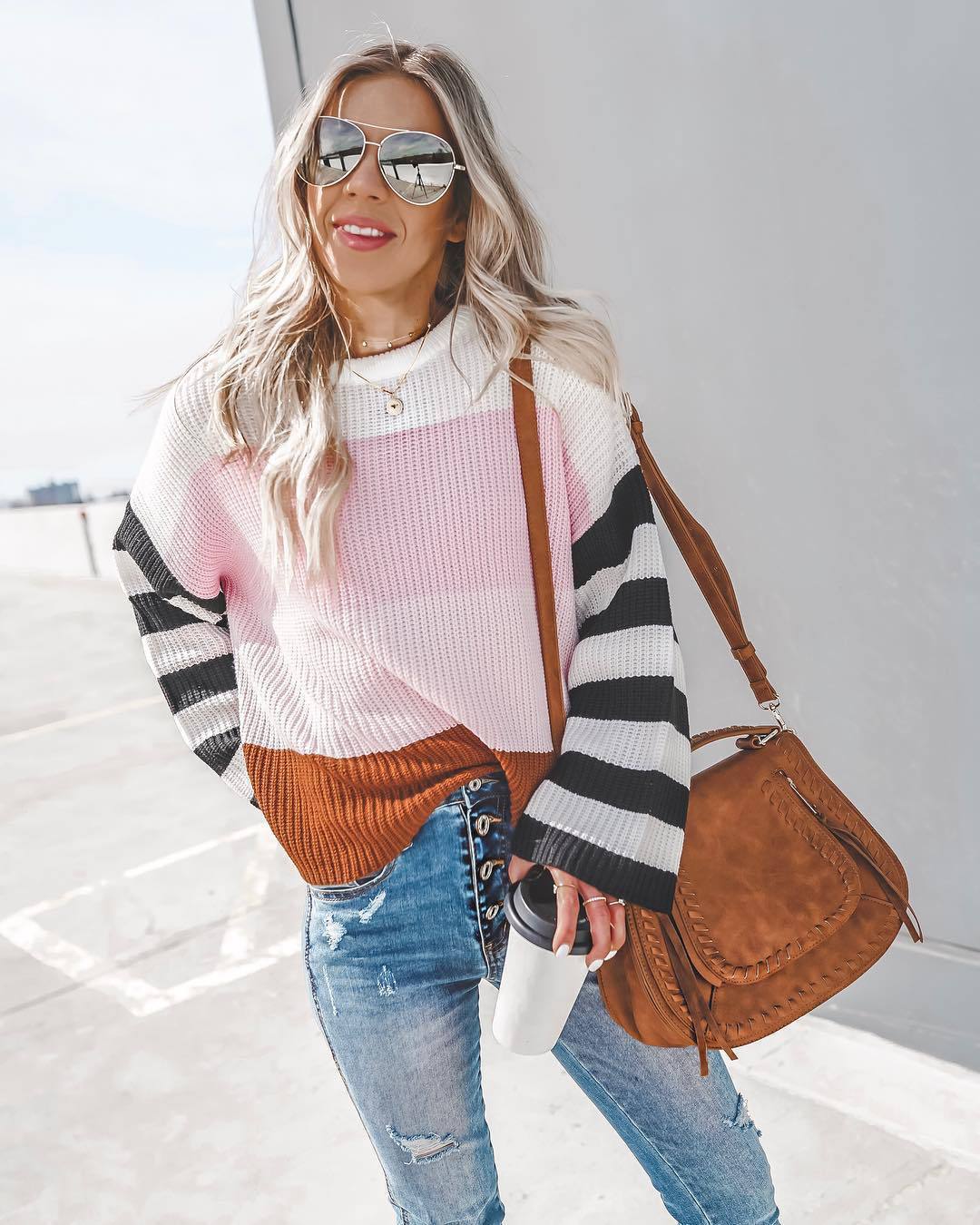 2021 Autumn and Winter Women's Color Splicing Knitwear featuring a stylish striped pattern in vibrant colors, made from soft acrylic fiber.