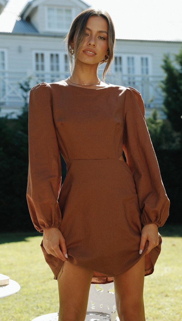 A stylish 2021 women's clothing dress featuring a crew neck, backless design, and long sleeves, made from 100% cotton in a solid color.