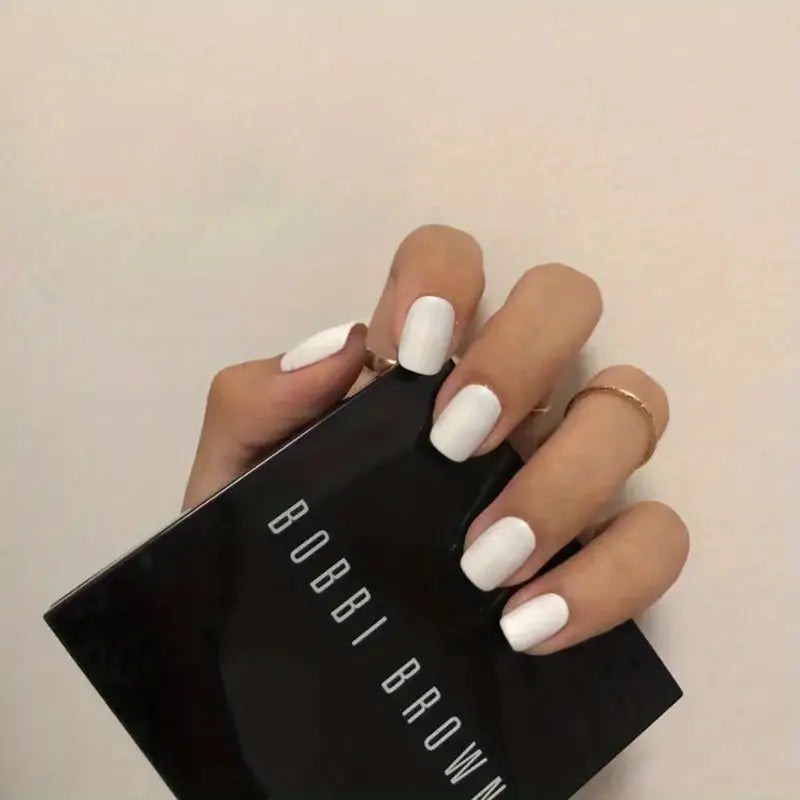 24 Pcs Press On Nails Short Matte White displayed elegantly, showcasing their chic matte finish and square shape.