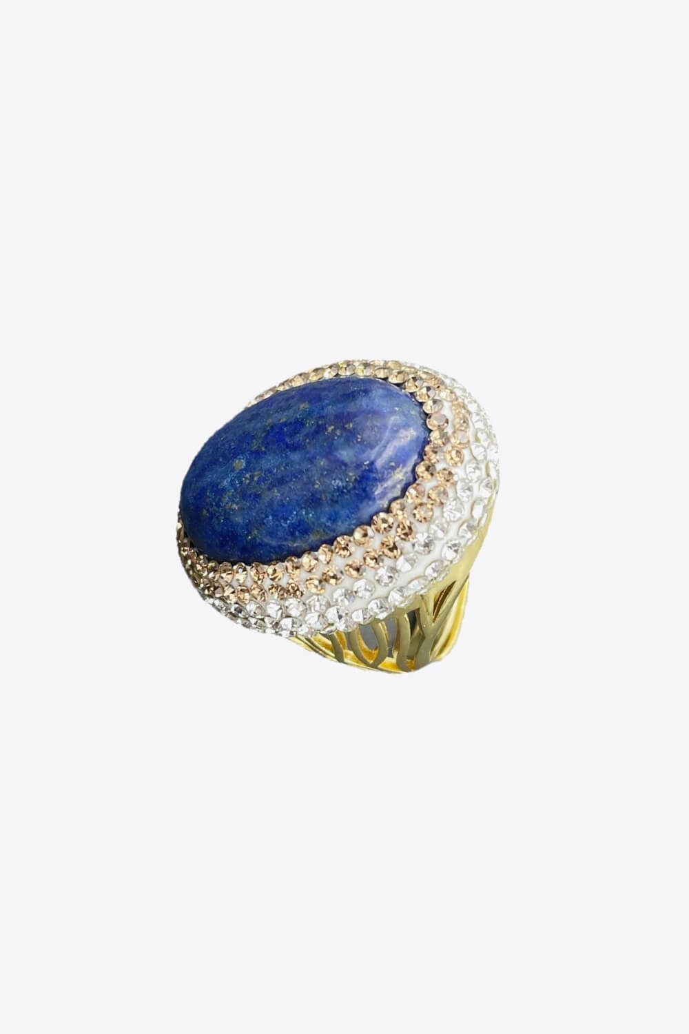 A flat lay image of a 24K gold-plated rhinestone ring featuring a minimalist design with lapis lazuli stone.