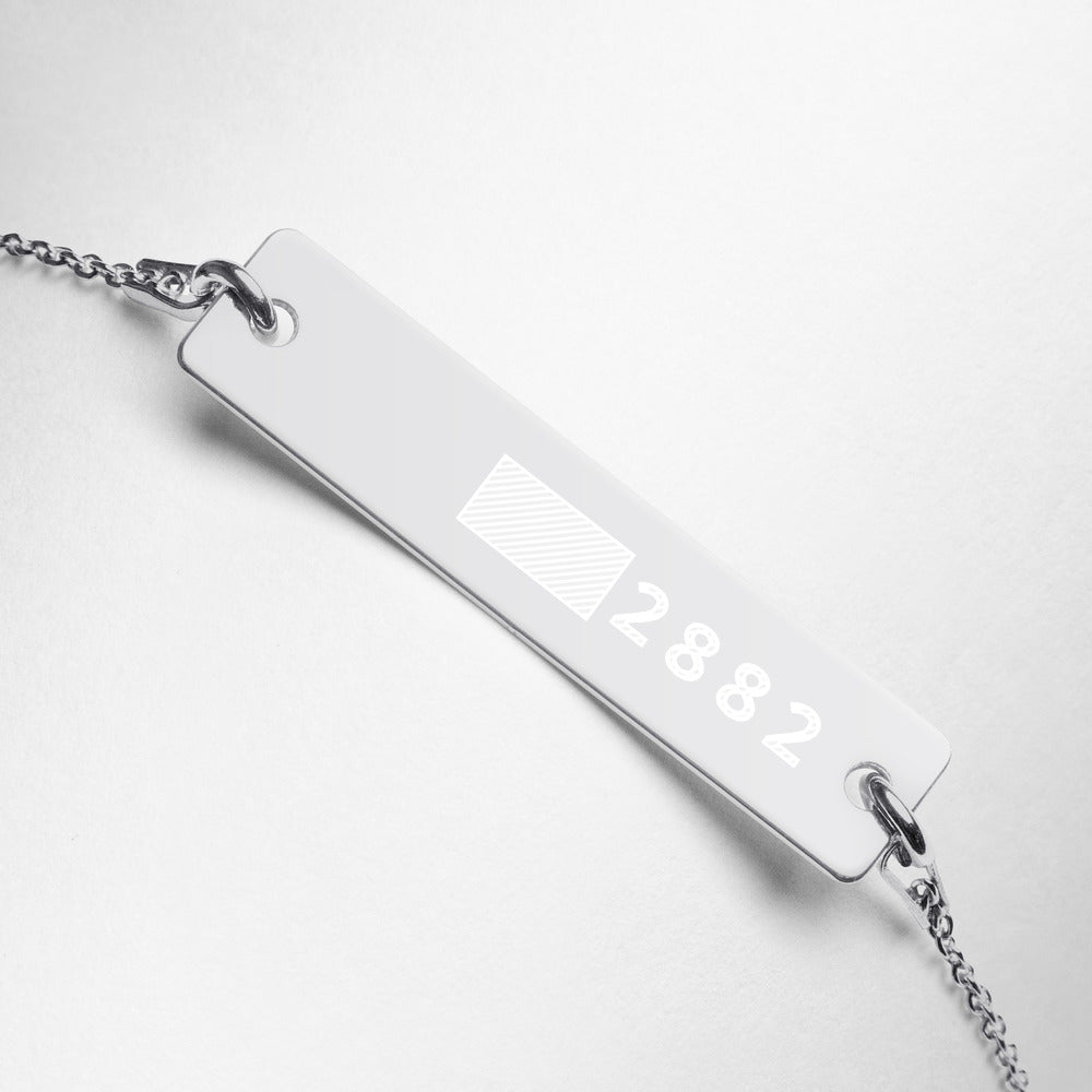 2882SetNStone™ Sterling Silver Blocked-In Chain ID Bracelet featuring an engraved bar pendant and a sleek chain design.