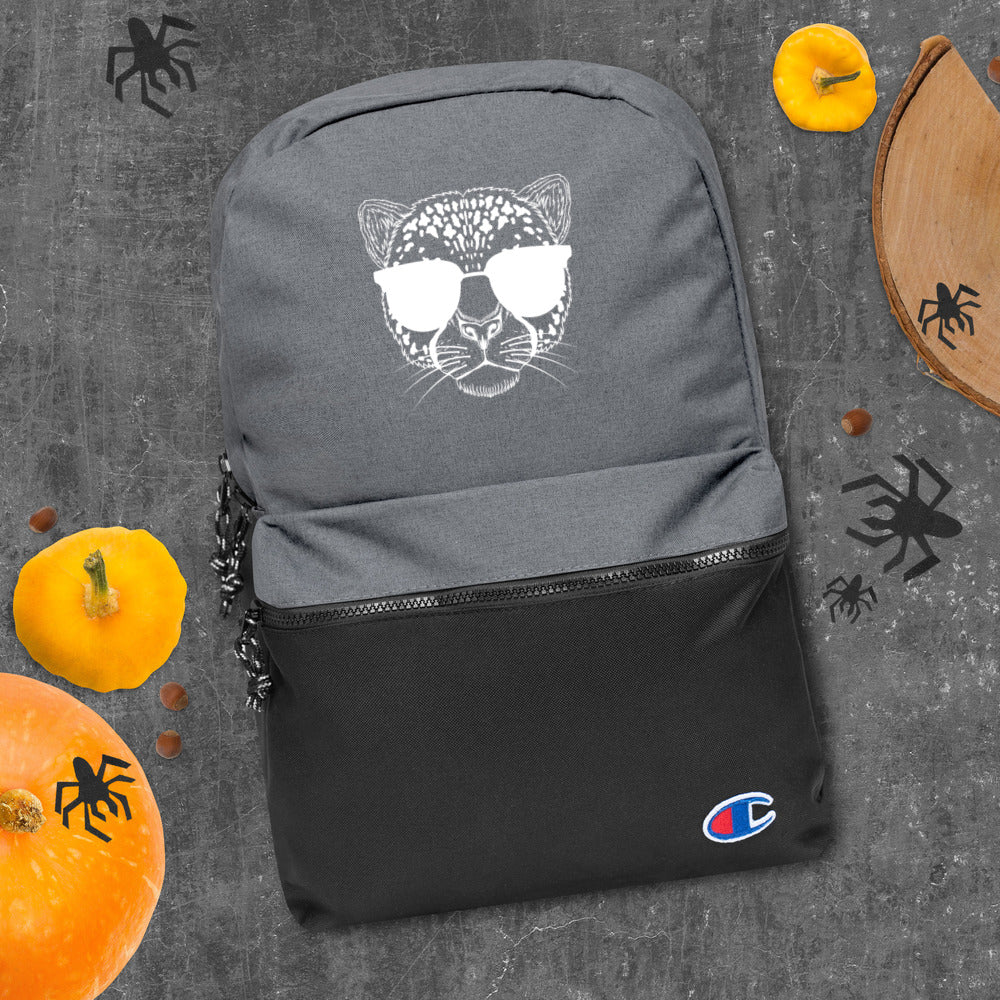 2882Sport™ Tropics Of OZ Champion backpack featuring an embroidered tiger design, water-resistant fabric, and padded ergonomic straps.