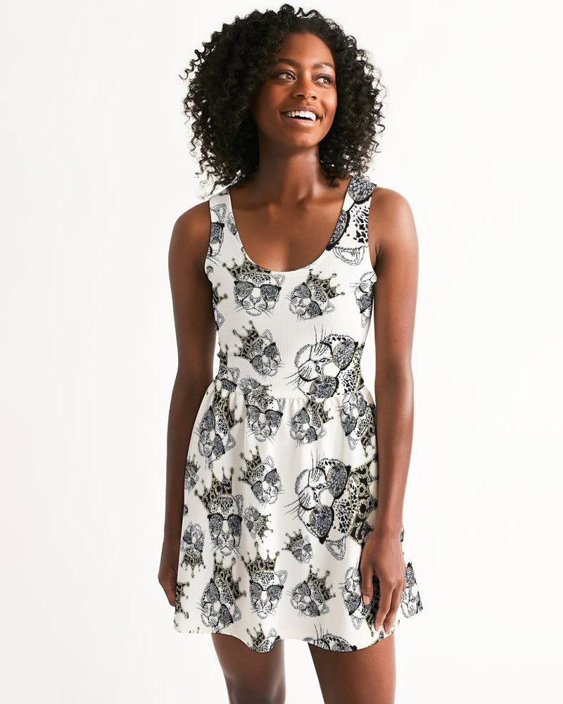 A stylish women's scoop neck skater dress featuring a vibrant jungle-inspired design with a lion motif, perfect for casual outings.