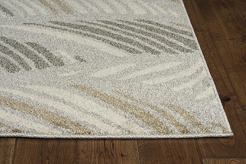 A stylish 2x3 grey and beige waves accent rug, showcasing elegant patterns suitable for indoor and outdoor use.