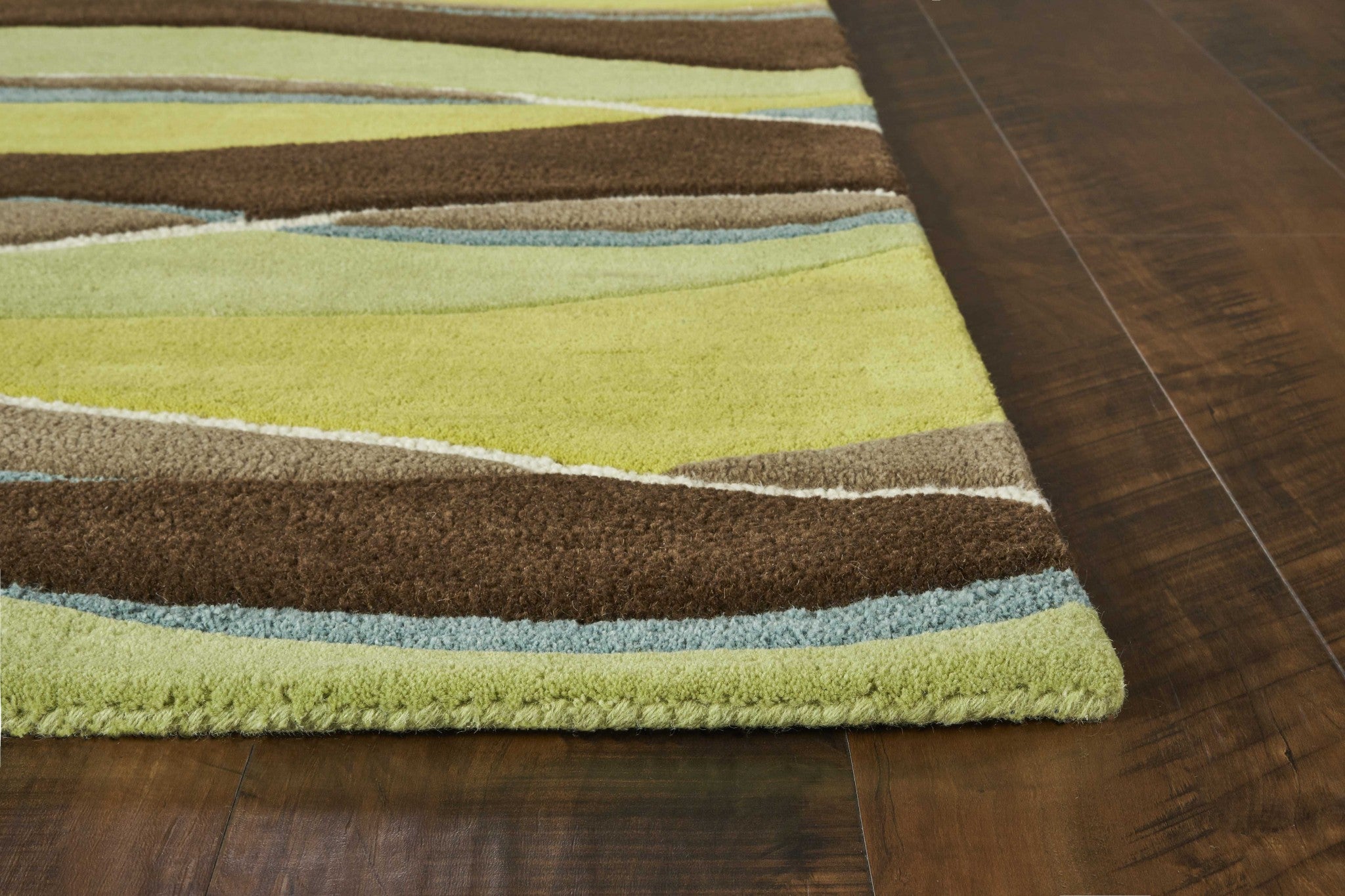 3' x 5' Lime and Mocha Abstract Waves Wool Area Rug showcasing vibrant colors and intricate patterns, perfect for modern home decor.