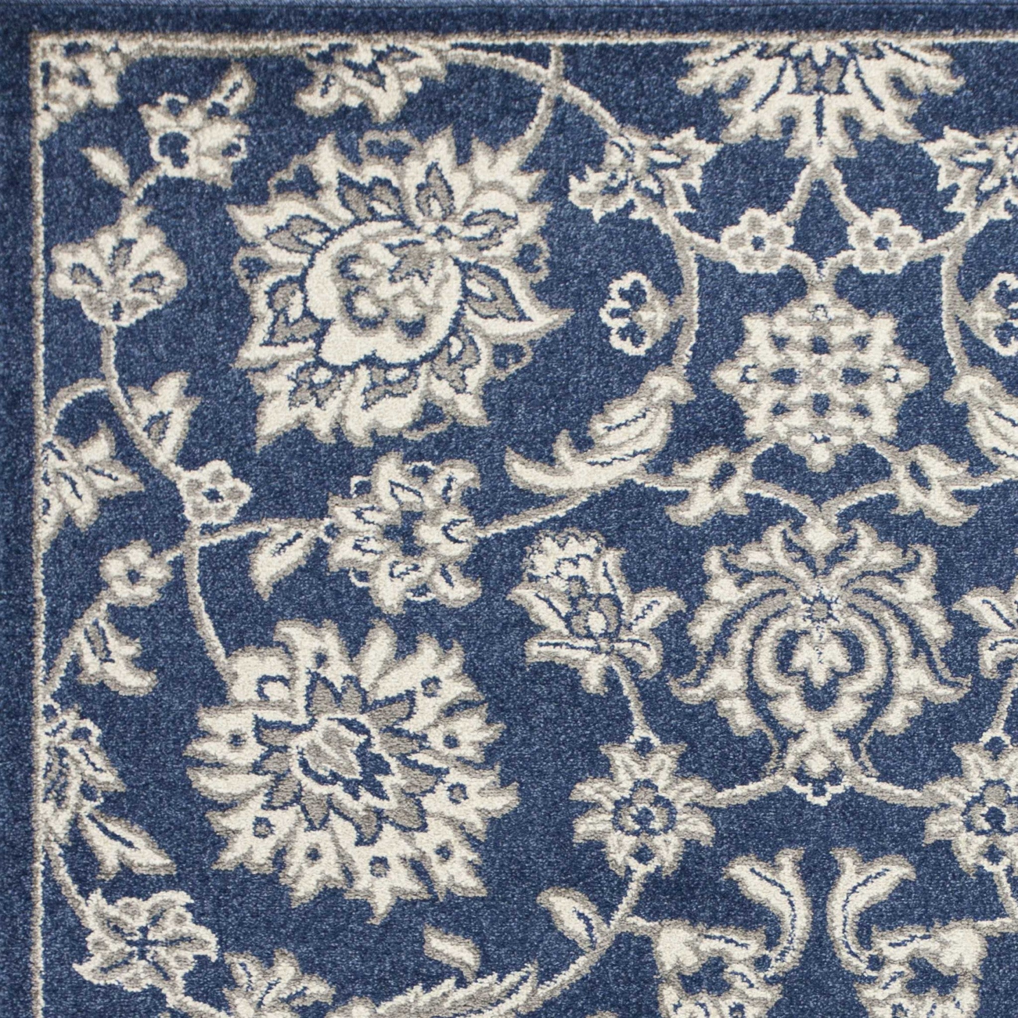 3x5 denim UV treated polypropylene area rug with elegant patterns, perfect for modern home decor.