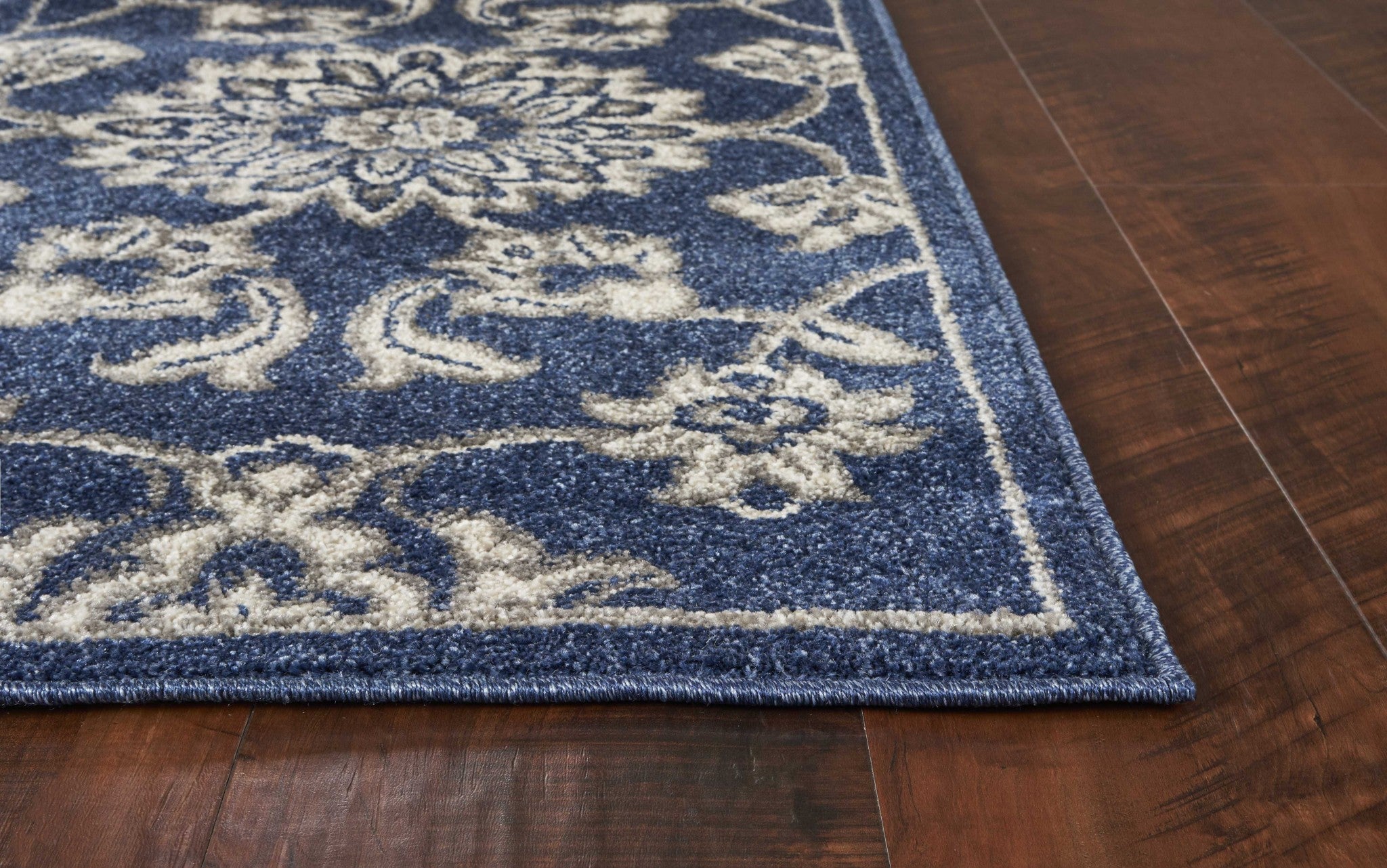 3x5 denim UV treated polypropylene area rug with elegant patterns, perfect for modern home decor.