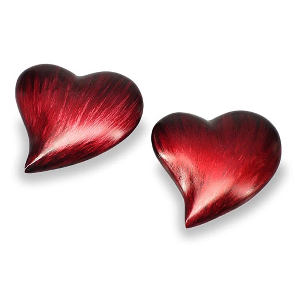 A set of two red glaze large heart decorative paperweights, showcasing a vibrant finish and elegant design, perfect for home or office decor.