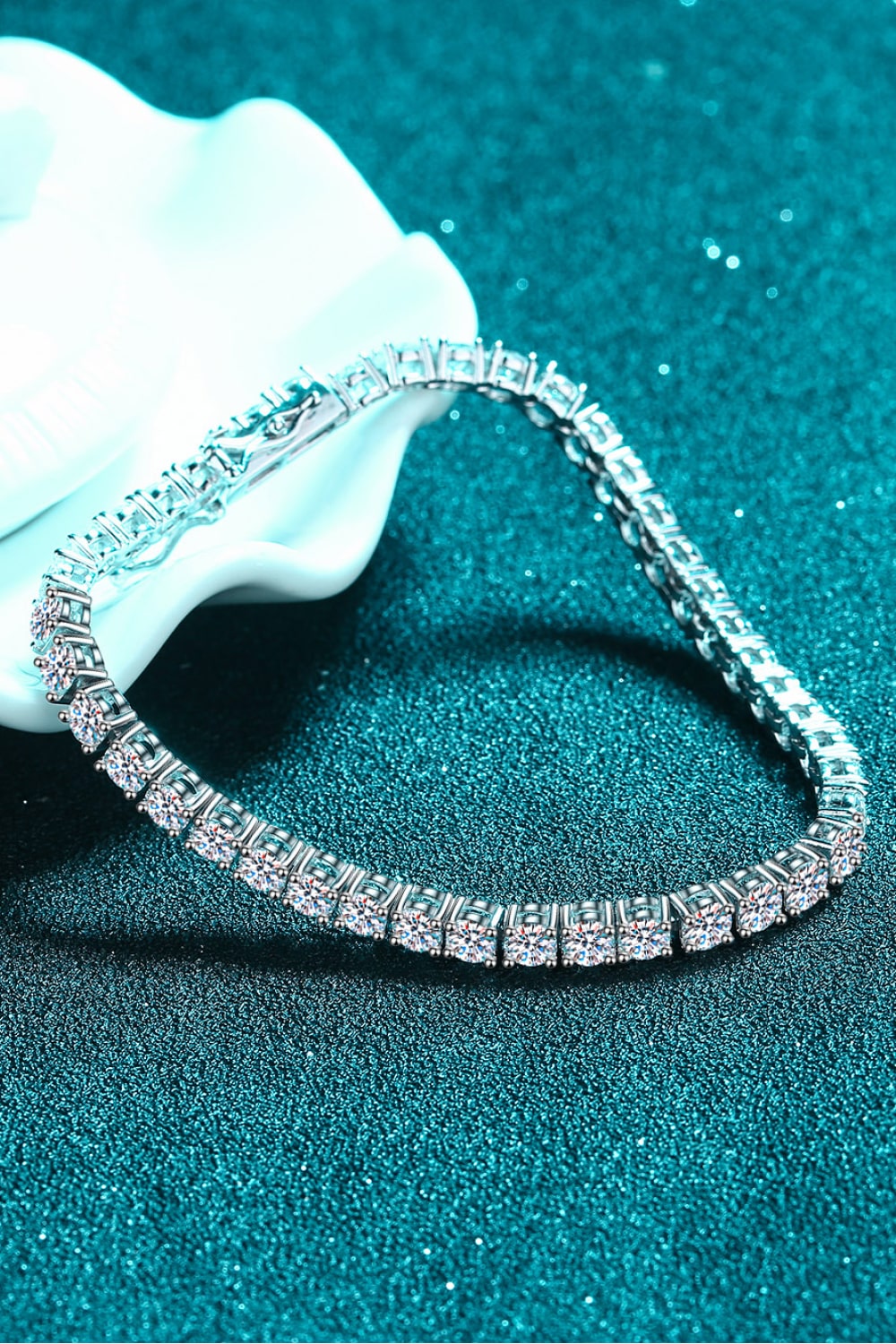 A stunning 4.9 Carat Moissanite Bracelet made of polished 925 sterling silver, showcasing its minimalist design and sparkling stones.