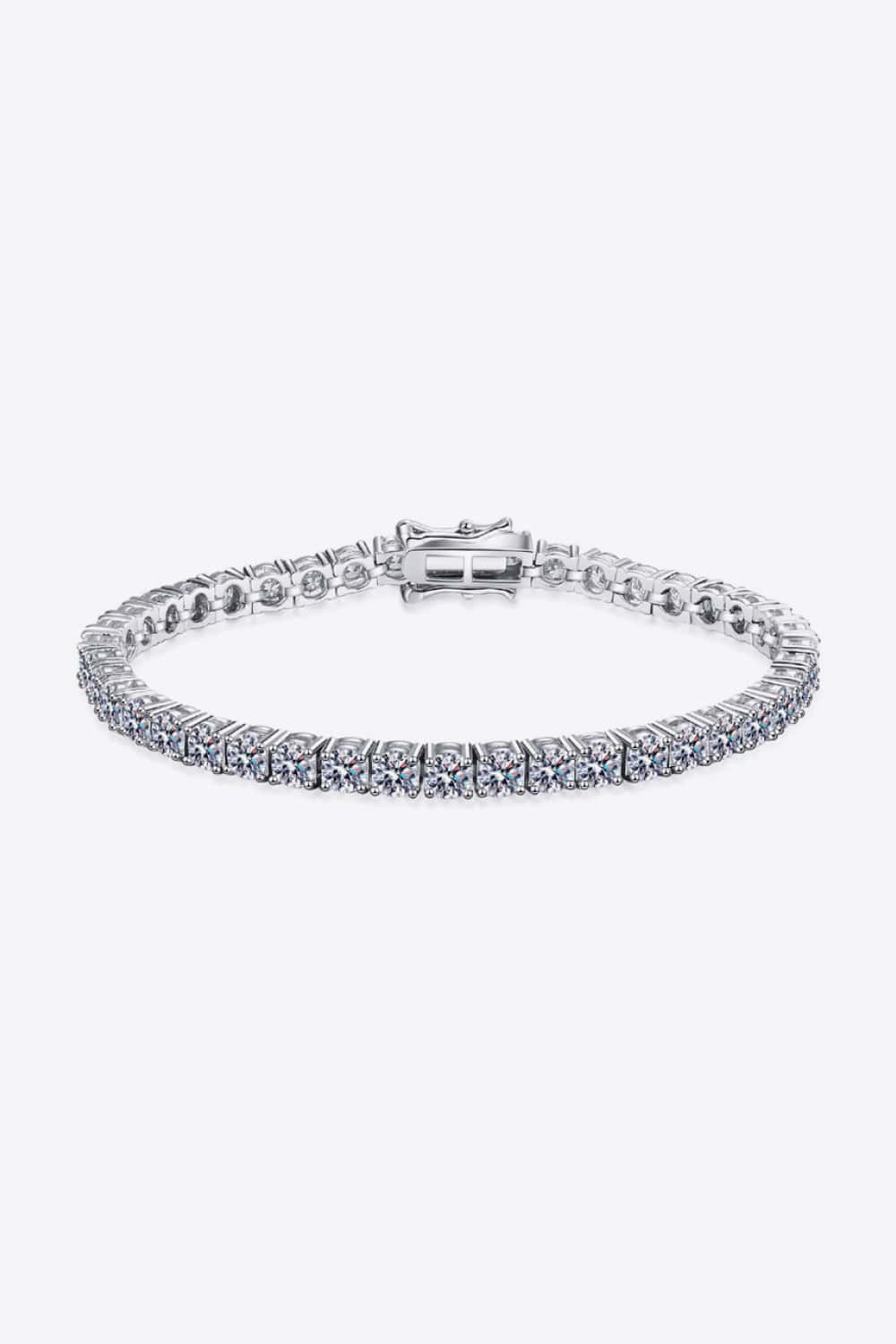 A stunning 4.9 Carat Moissanite Bracelet made of polished 925 sterling silver, showcasing its minimalist design and sparkling stones.