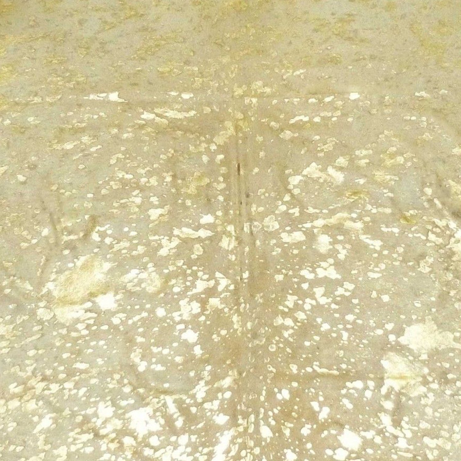 5.5 Ft Gold Devore on White Brindled Cowhide Rug showcasing unique patterns and textures, perfect for home decor.