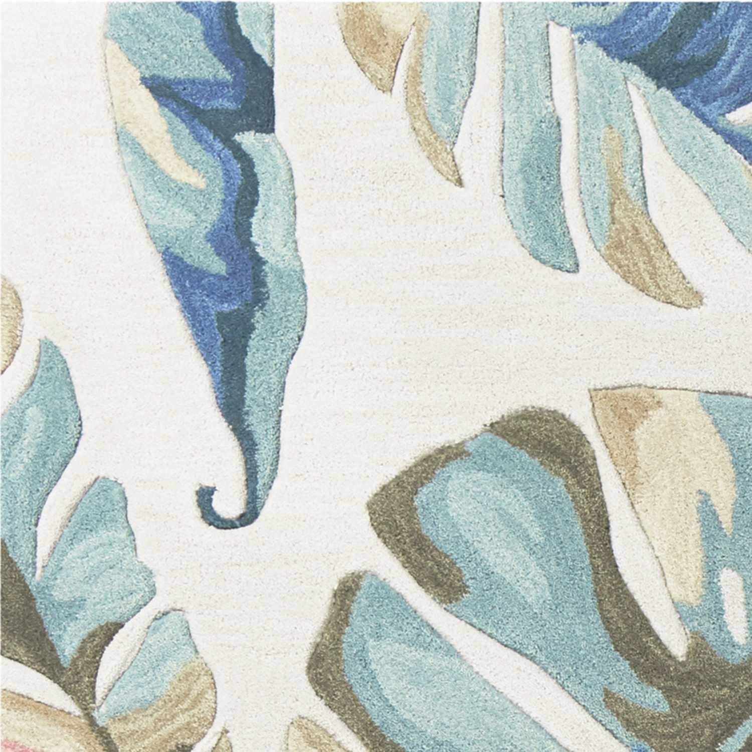 5' x 7' Ivory and Blue Palms Area Rug featuring a vibrant palm tree design in shades of blue and green.