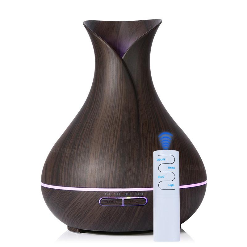 550ml Aroma Essential Oil Diffuser in yellow, showcasing its sleek design and mist output.