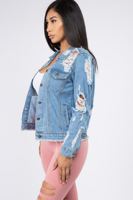 Distressed button down denim jacket featuring a classic design with a stylish worn look, made from 80% cotton and 20% polyester.