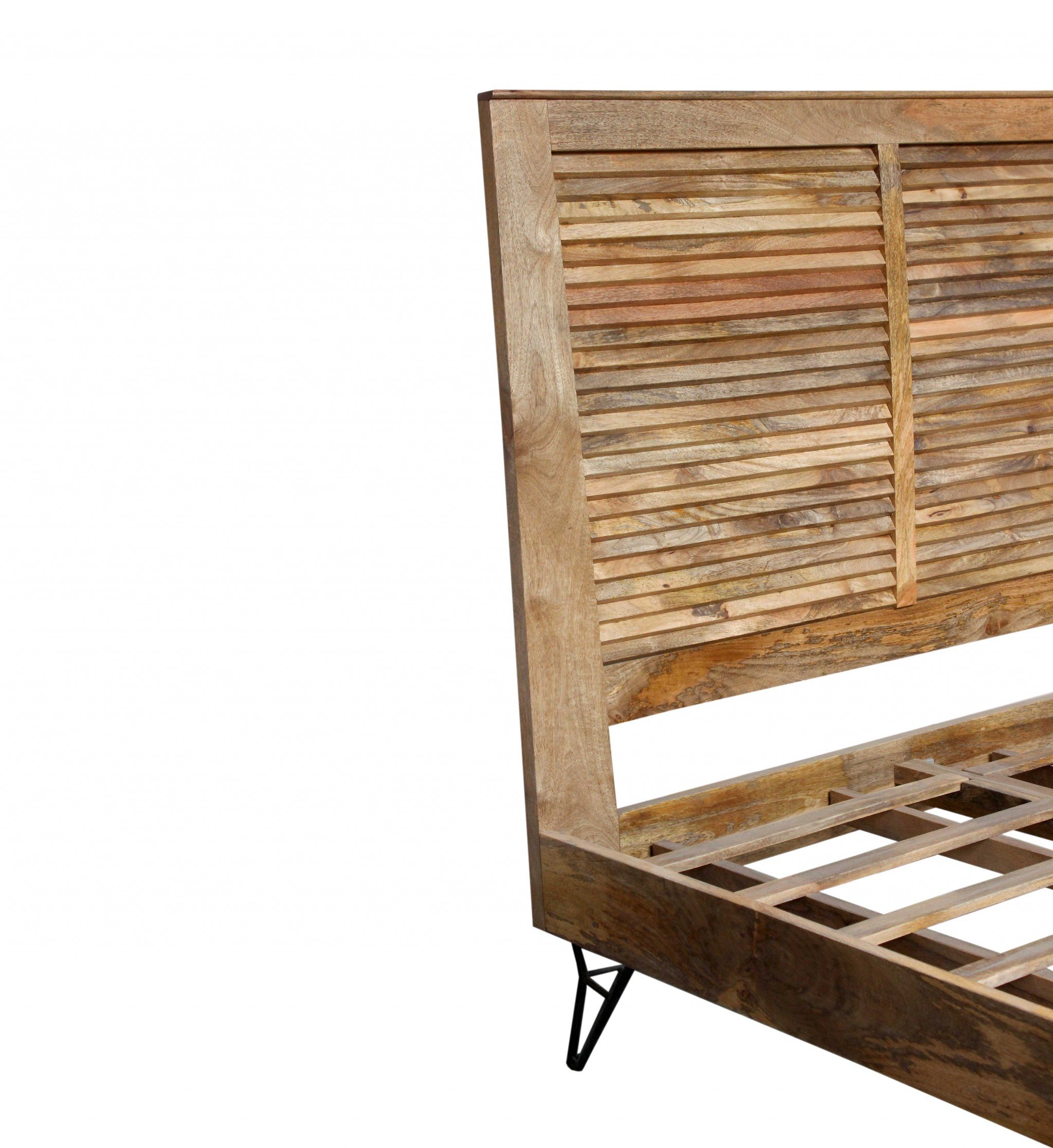 A rustic queen size bed made of natural acacia wood with a high headboard and footboard, featuring black iron origami legs and an open slat system.