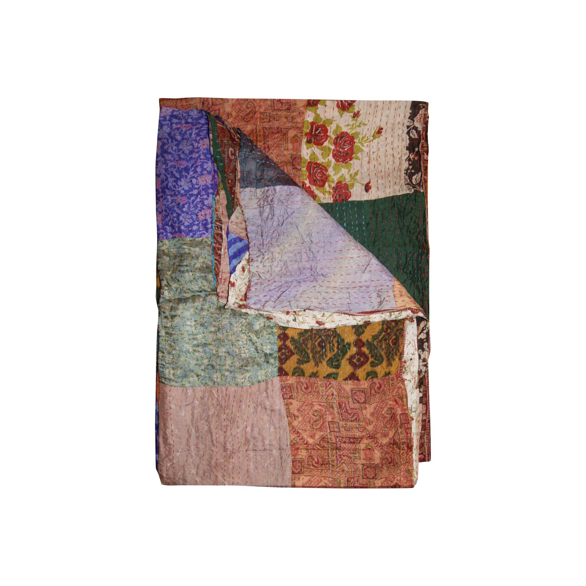 A vibrant 60x90 inches silk multicolor throw showcasing intricate patchwork and embroidery, handcrafted by Indian artisans.