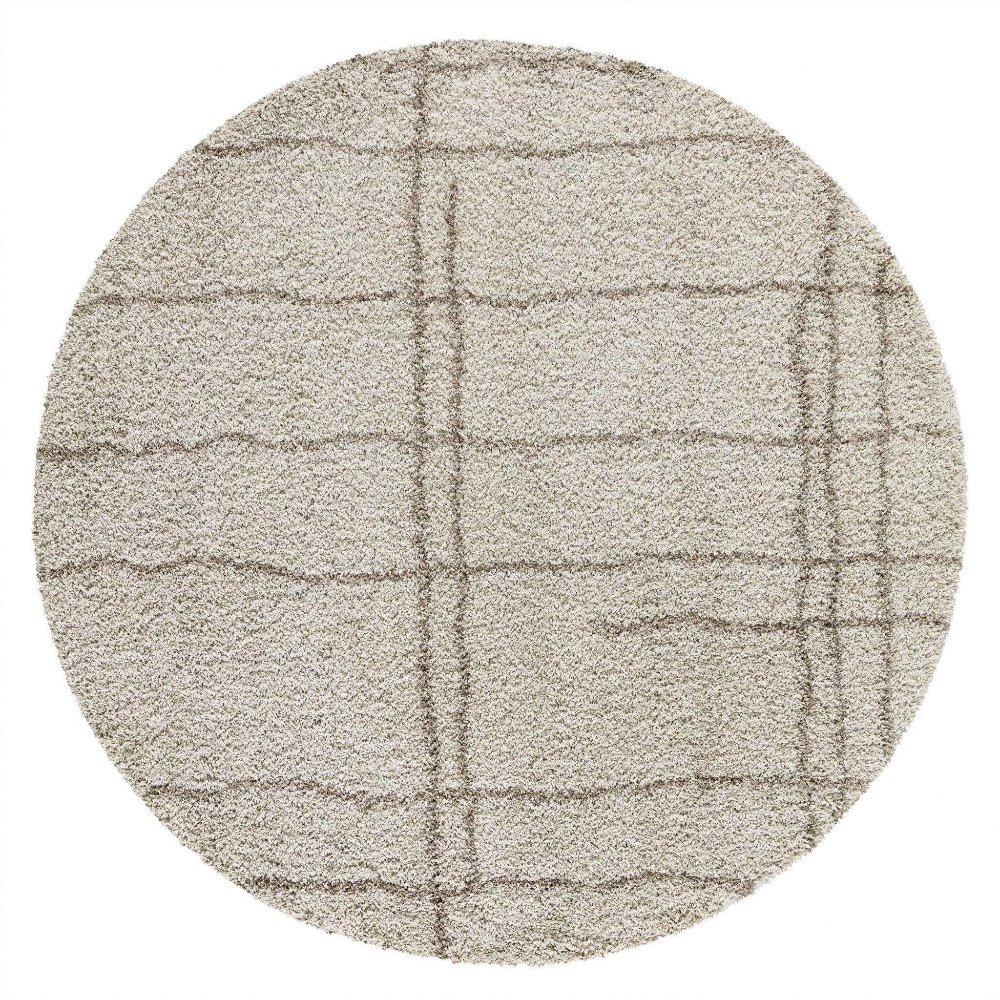 A 63" X 91" X 2" Natural Polypropylene Rug featuring a soft shag texture and neutral colors, perfect for enhancing home decor.