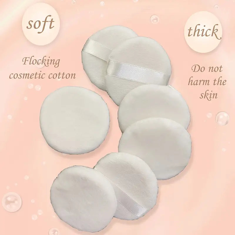 A set of 7 round makeup sponges with durable straps, designed for seamless blending of foundation and concealer.