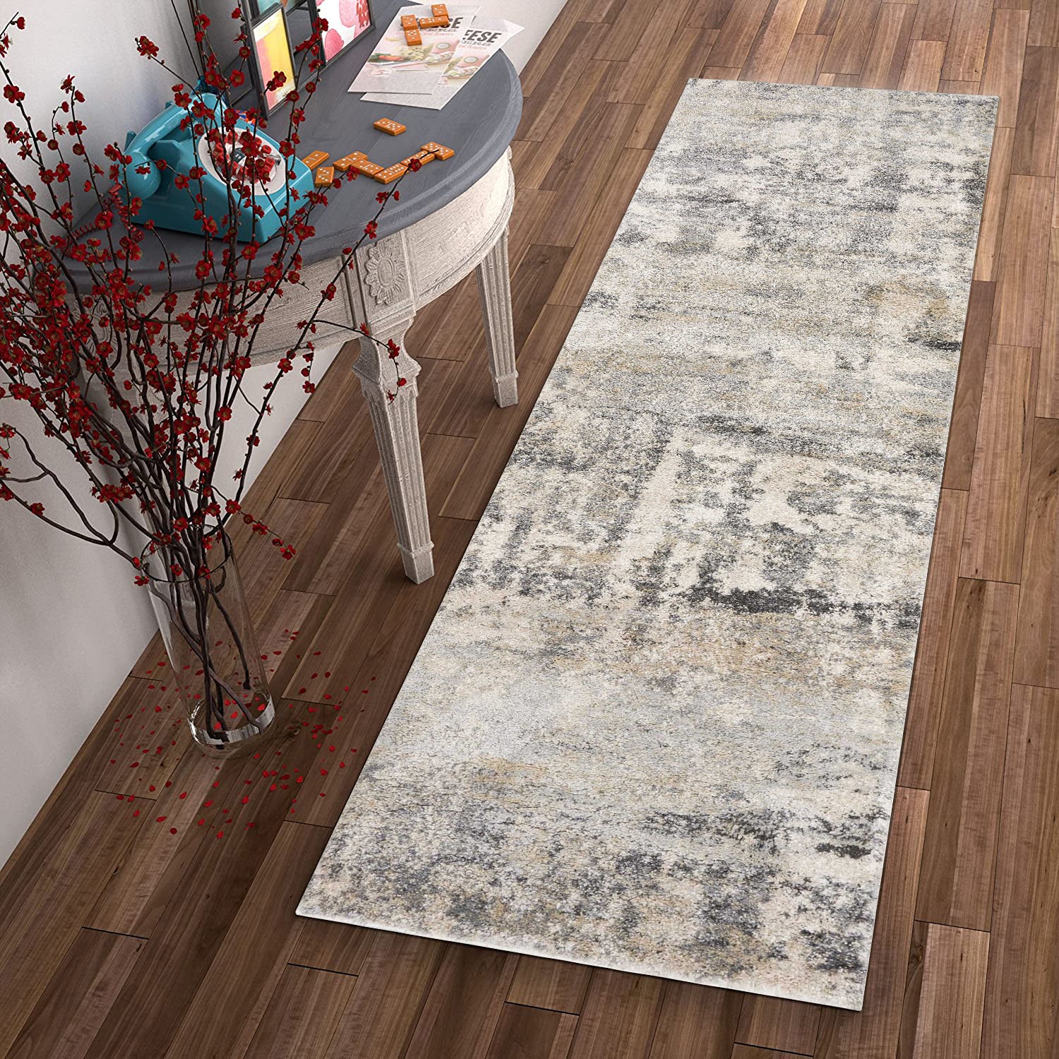 7-inch Natural Beige Machine Woven Abstract Brushstrokes Indoor Rug showcasing abstract patterns and a soft texture, perfect for home decor.