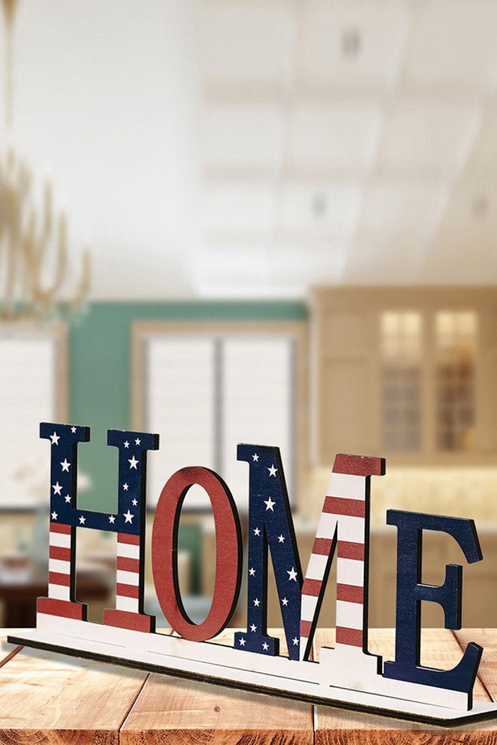 A vibrant set of 7-piece Independence Day letter decor ornaments made from knit fabric, showcasing red, white, and blue colors.