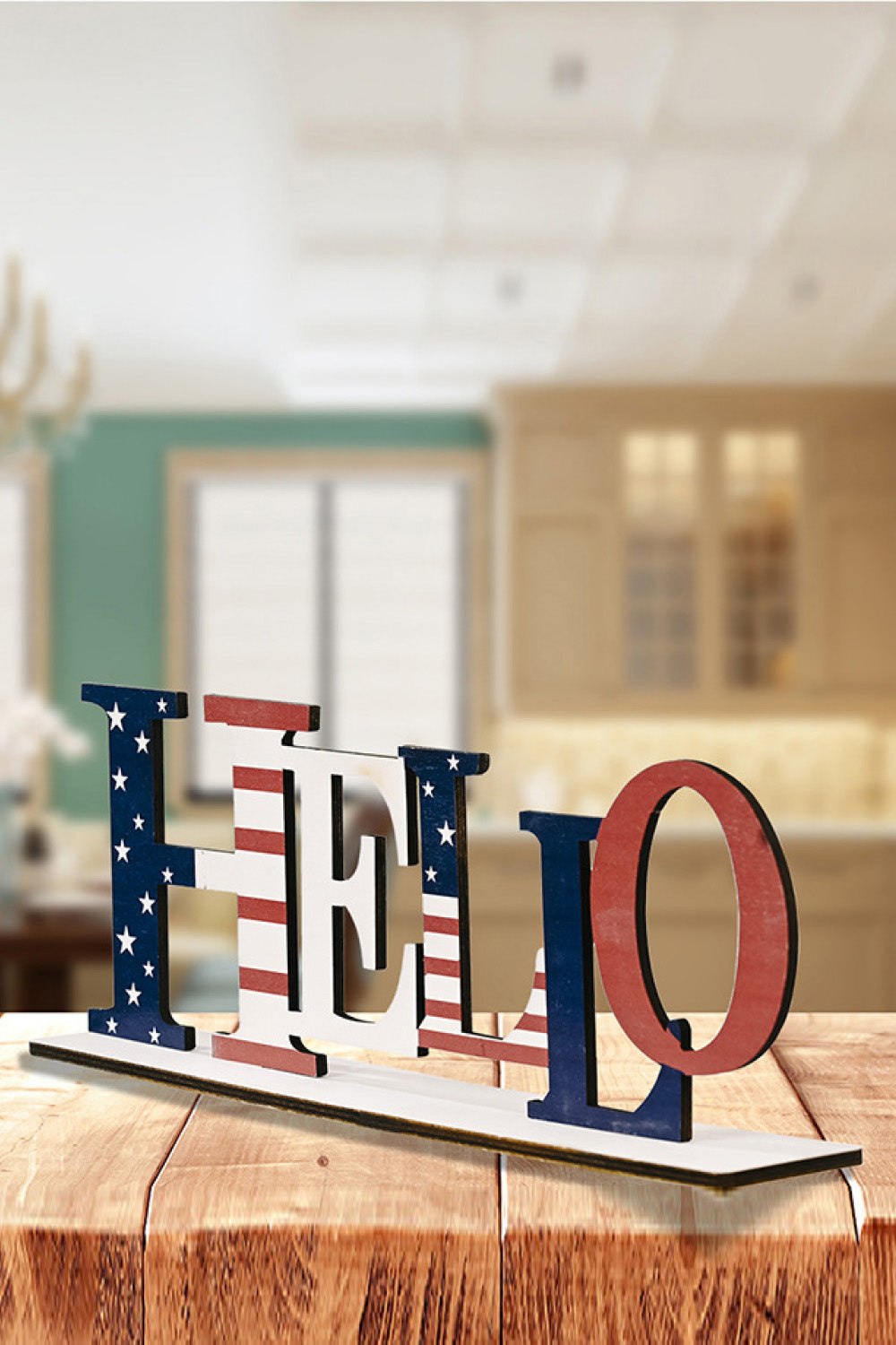 A vibrant set of 7-piece Independence Day letter decor ornaments made from knit fabric, showcasing red, white, and blue colors.