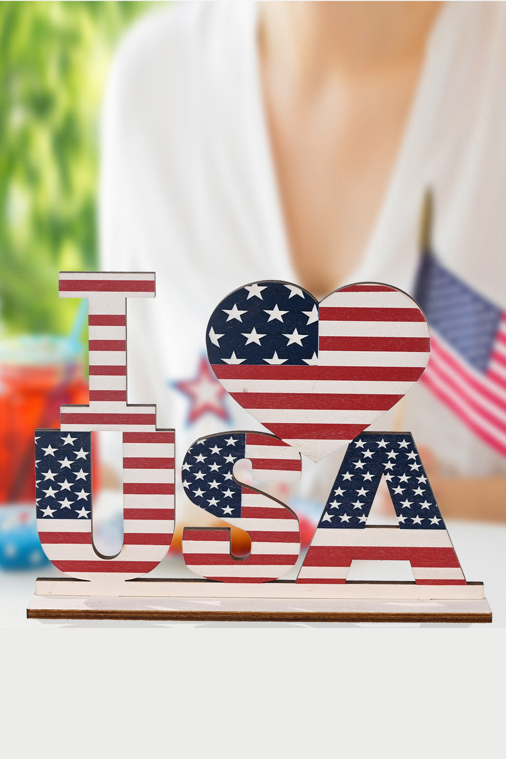 A vibrant set of 7-piece Independence Day letter decor ornaments made from knit fabric, showcasing red, white, and blue colors.