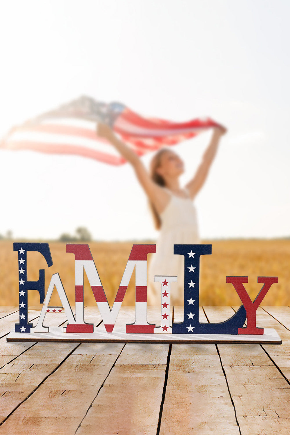 A vibrant set of 7-piece Independence Day letter decor ornaments made from knit fabric, showcasing red, white, and blue colors.