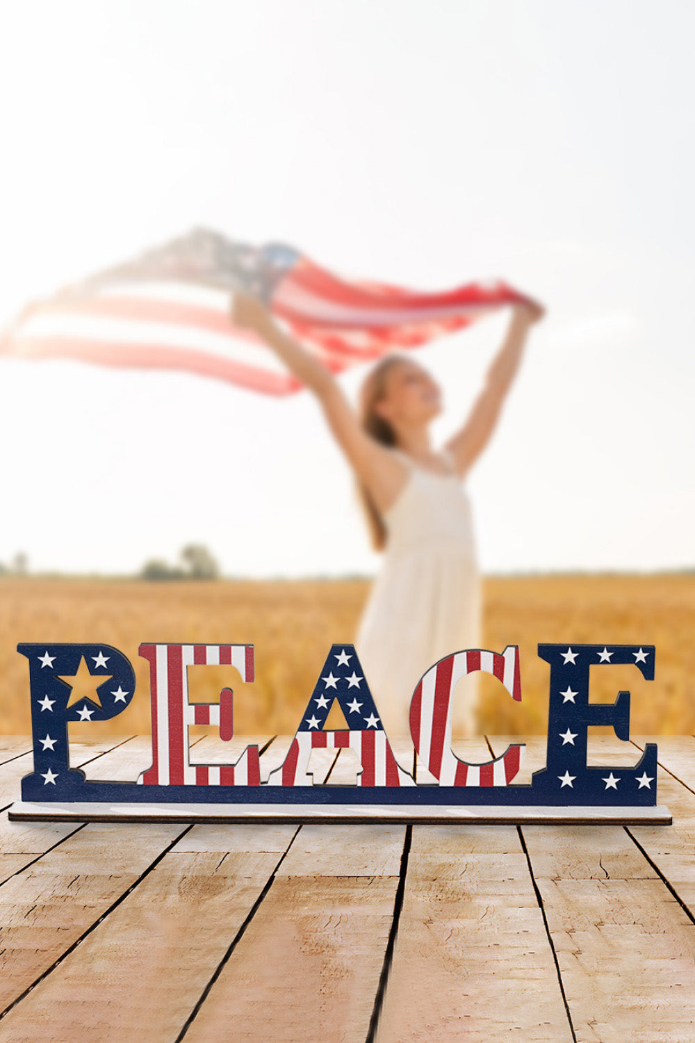 A vibrant set of 7-piece Independence Day letter decor ornaments made from knit fabric, showcasing red, white, and blue colors.