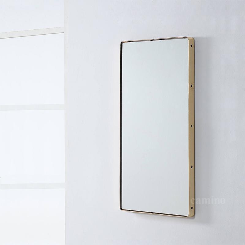 A large 80" x 80" x 4" Clear Steel Glass Mirror with a stylish brass frame, showcasing a minimalist design suitable for various interior styles.