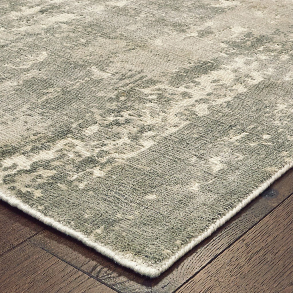 Gray and Ivory Abstract Splash Indoor Area Rug, showcasing a beautiful splash design on a soft viscose fiber surface, perfect for indoor spaces.