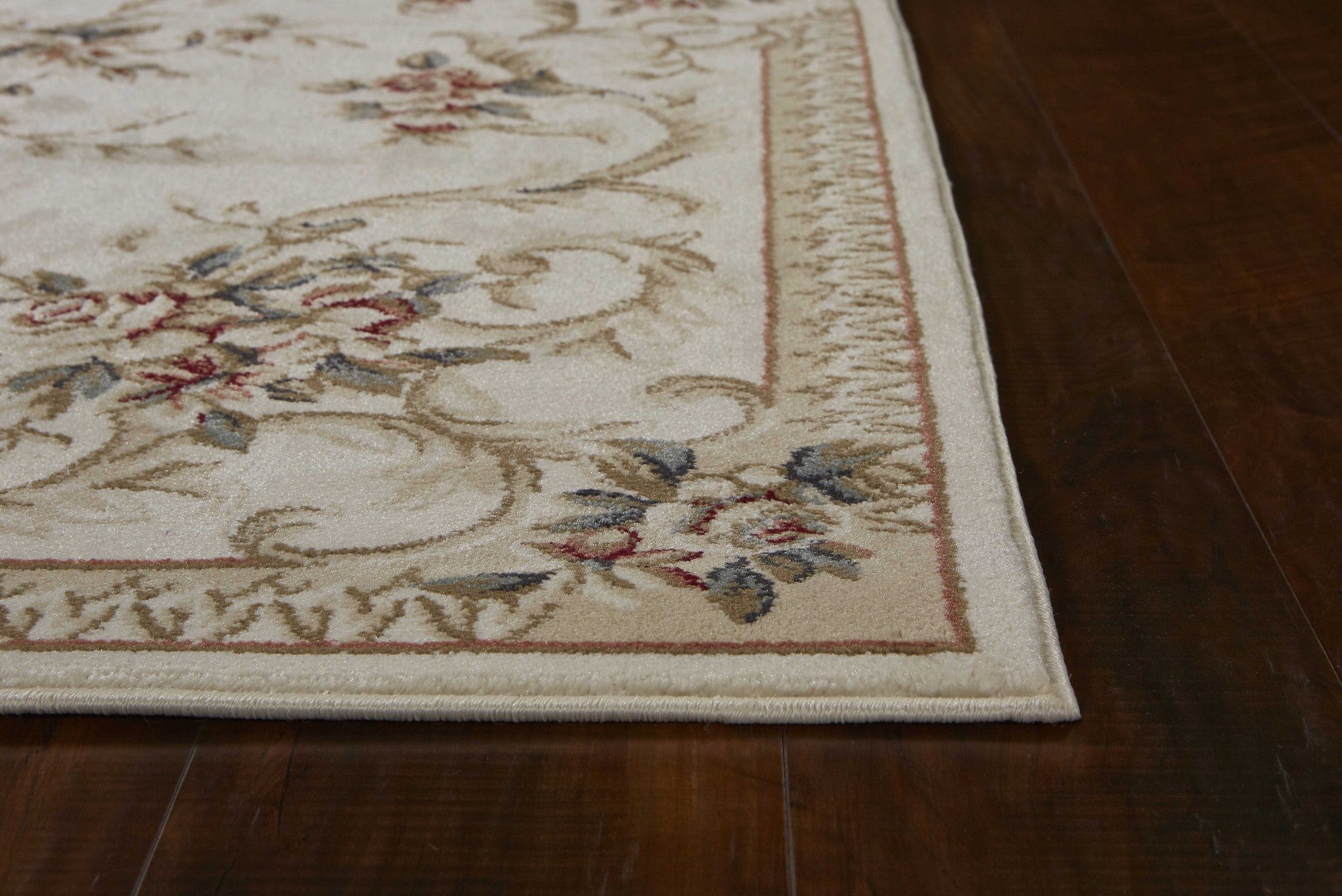 A luxurious 9x12 inches ivory polypropylene area rug, showcasing a modern design suitable for living rooms.