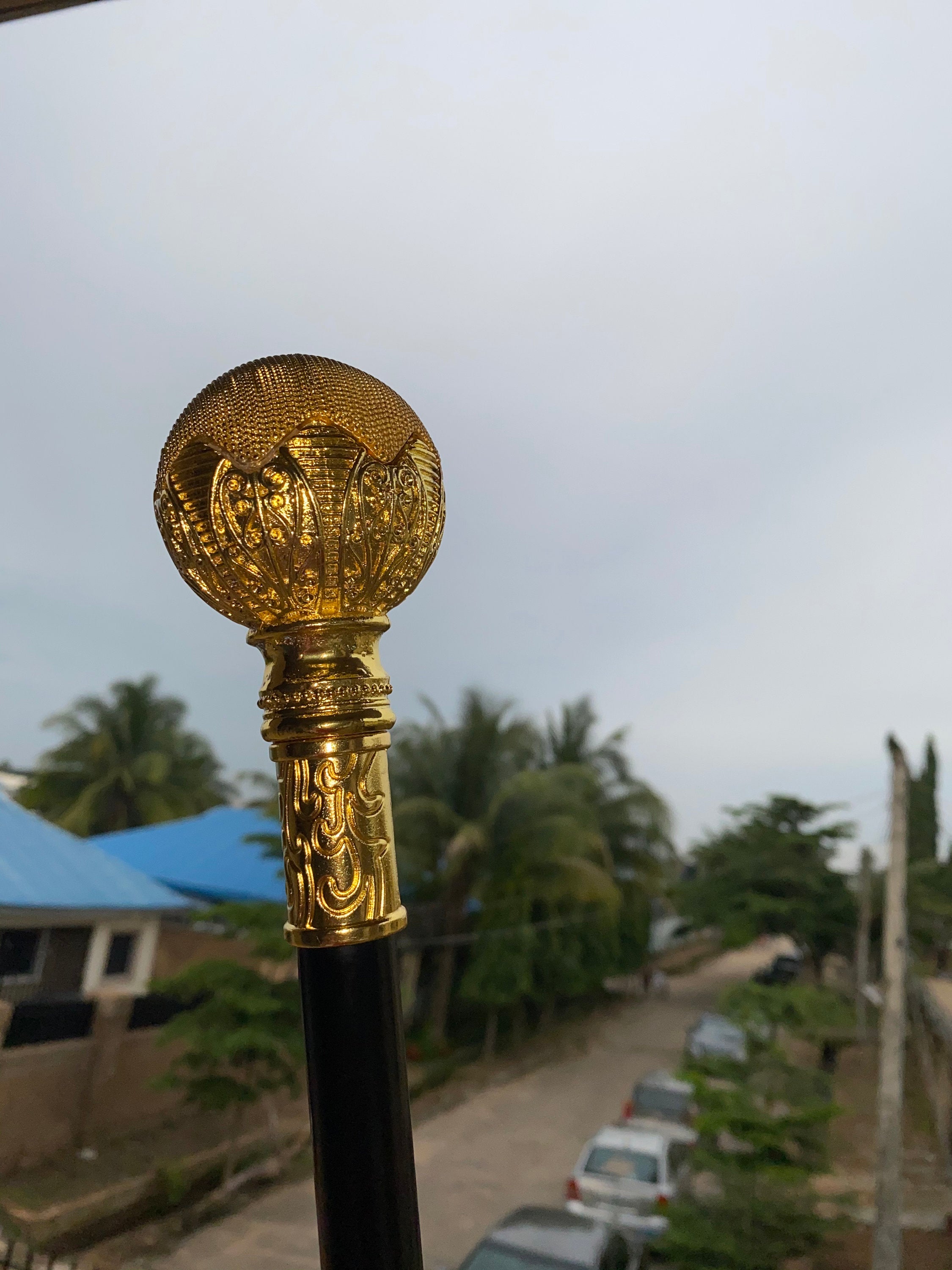 Stylish Abstract Cane with a solid copper collar, black shaft, and a choice of gold or silver head, showcasing luxury and elegance.