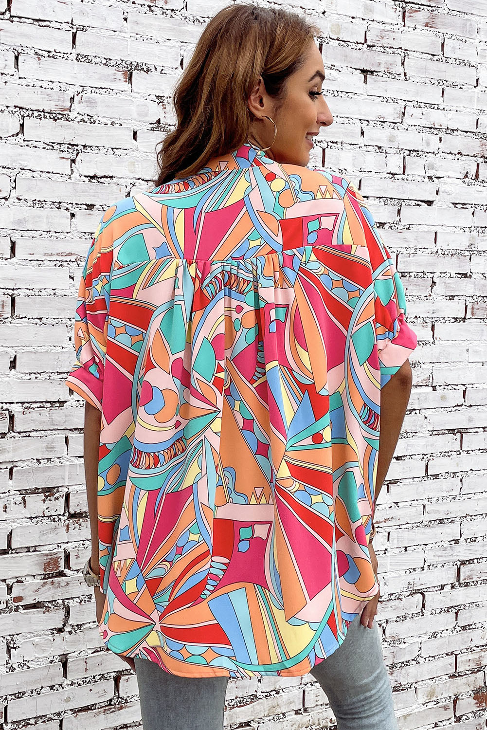 A stylish Abstract Half Puff Sleeve Loose Shirt featuring a vibrant abstract geometry print, designed for comfort and elegance.