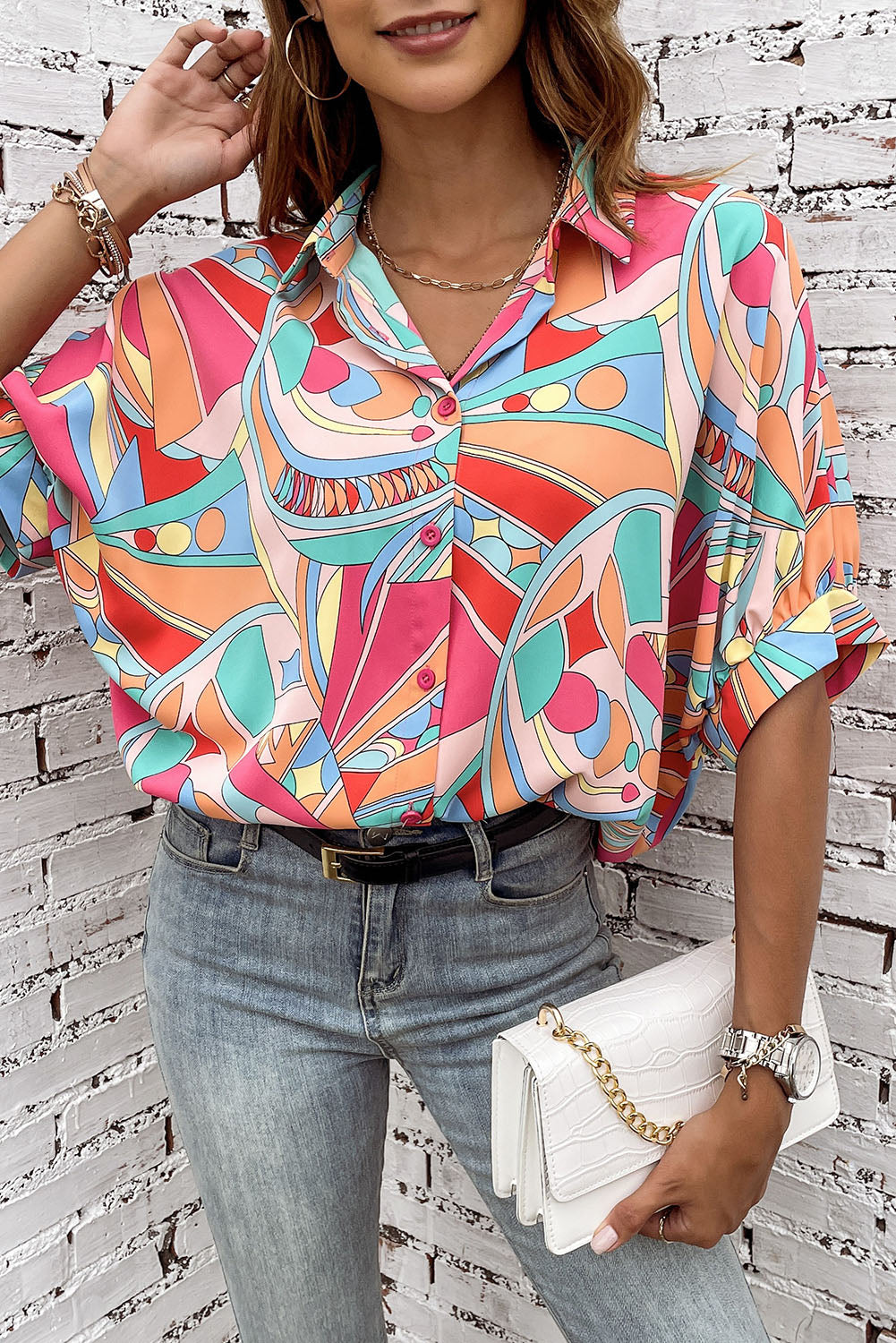 A stylish Abstract Half Puff Sleeve Loose Shirt featuring a vibrant abstract geometry print, designed for comfort and elegance.