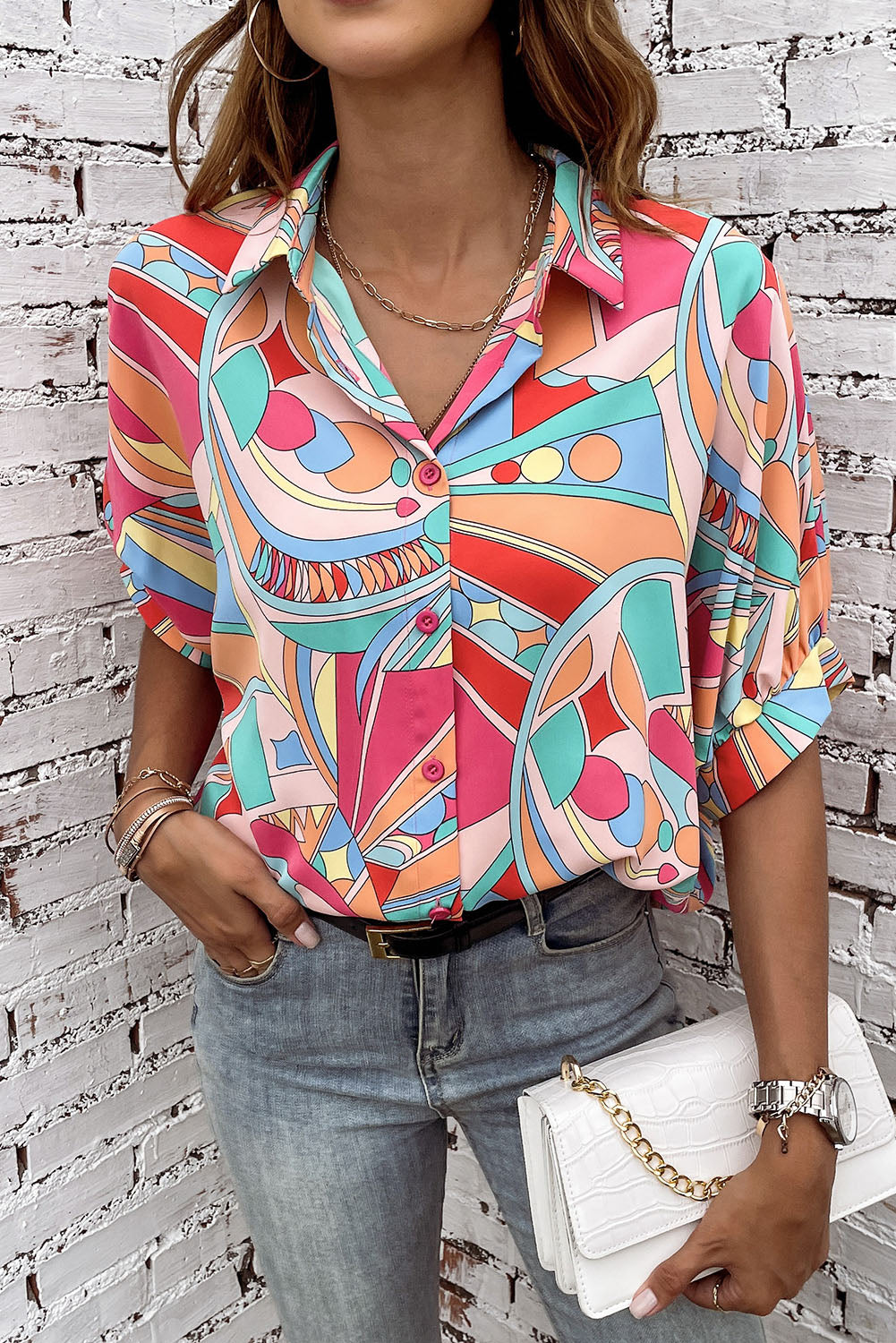 A stylish Abstract Half Puff Sleeve Loose Shirt featuring a vibrant abstract geometry print, designed for comfort and elegance.