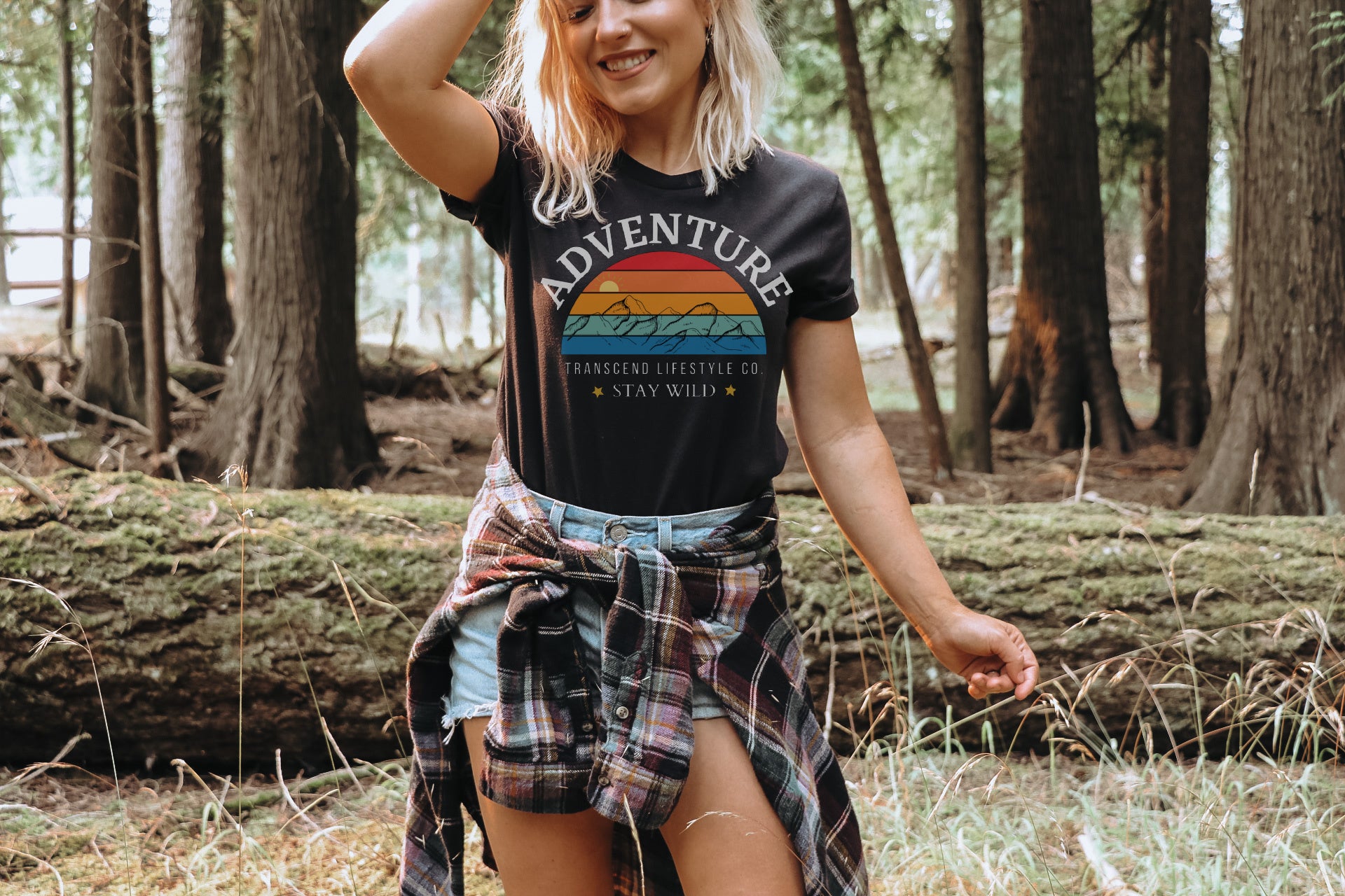 Adventure Unisex Tee in various dark colors, showcasing its soft fabric and comfortable fit.