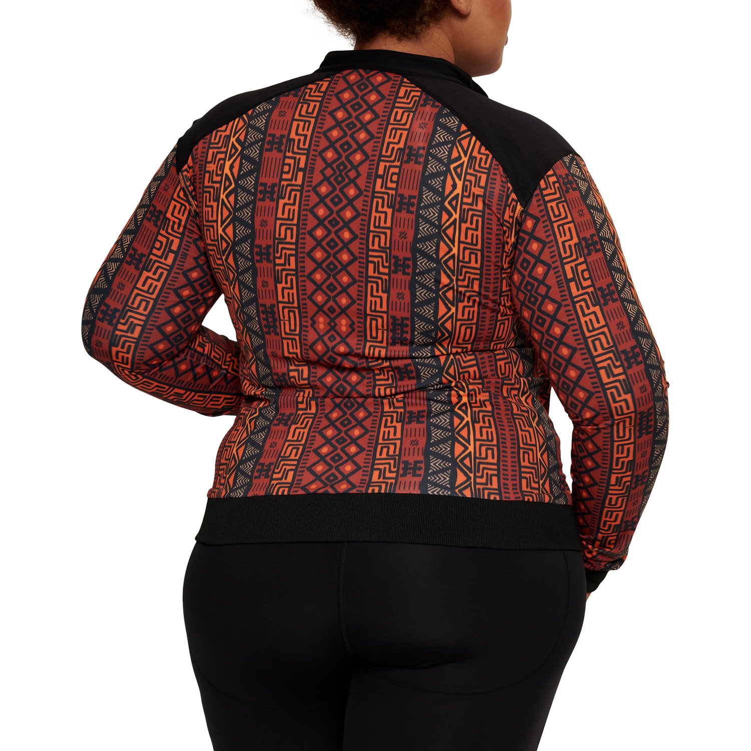 A stylish African Jacket designed for plus-size women, featuring vibrant prints and a flattering fit, perfect for workouts and casual outings.