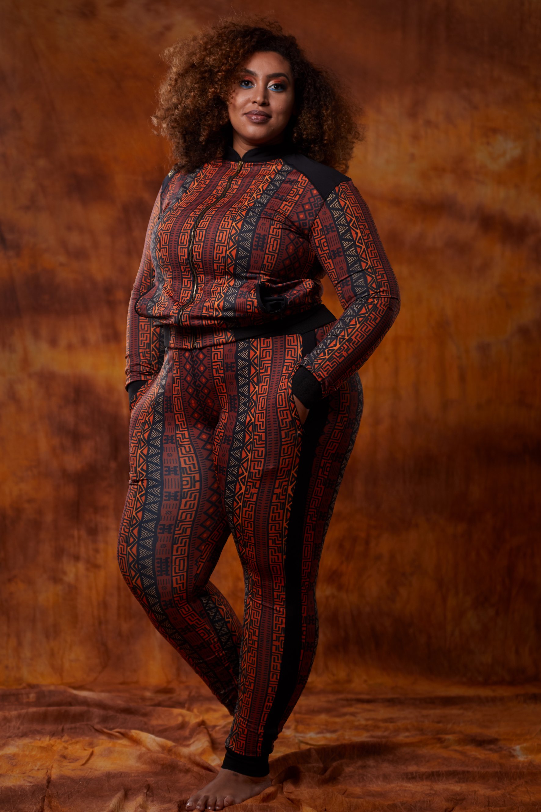 A stylish African Tracksuit featuring vibrant prints, designed for plus size and curvy women, showcasing comfort and elegance.