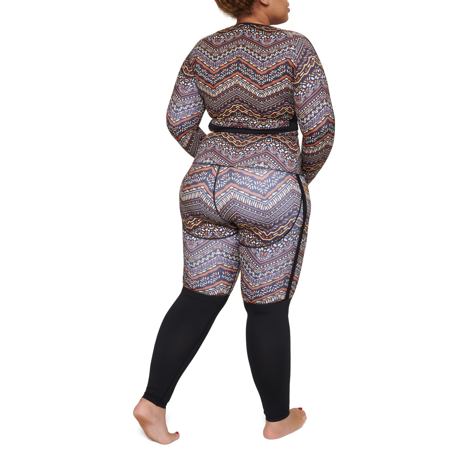 Afriq leggings featuring a two-tone design with black and vibrant patterns, perfect for workouts and casual wear.