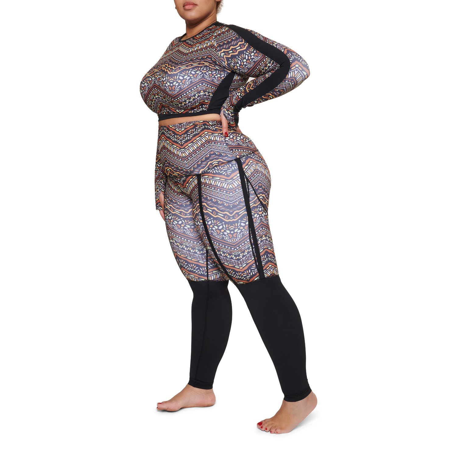 Afriq leggings featuring a two-tone design with black and vibrant patterns, perfect for workouts and casual wear.