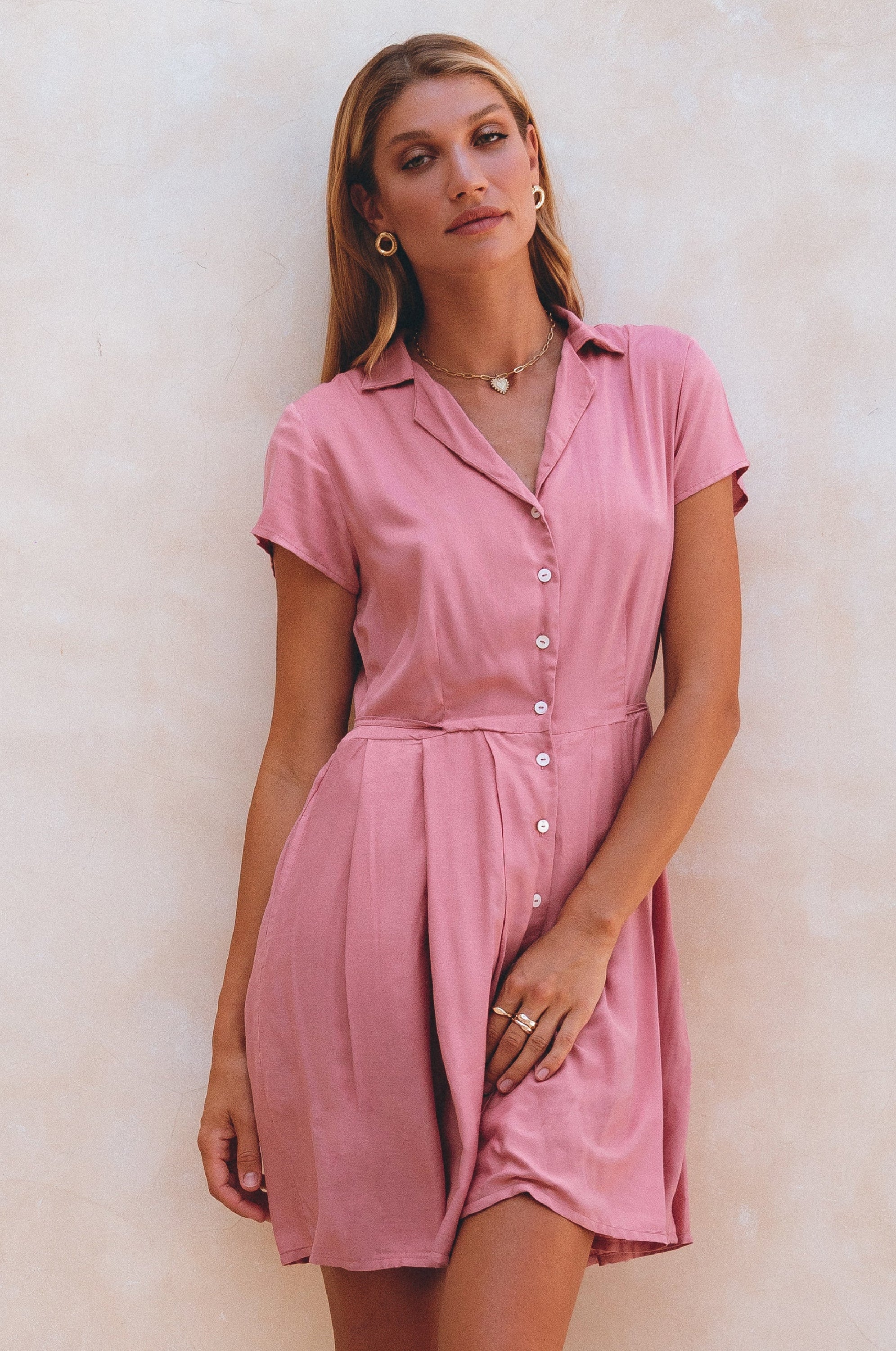 Agnes Shirt Dress featuring a button-down design, V-neckline, and self-tie waist in a breezy mini length.