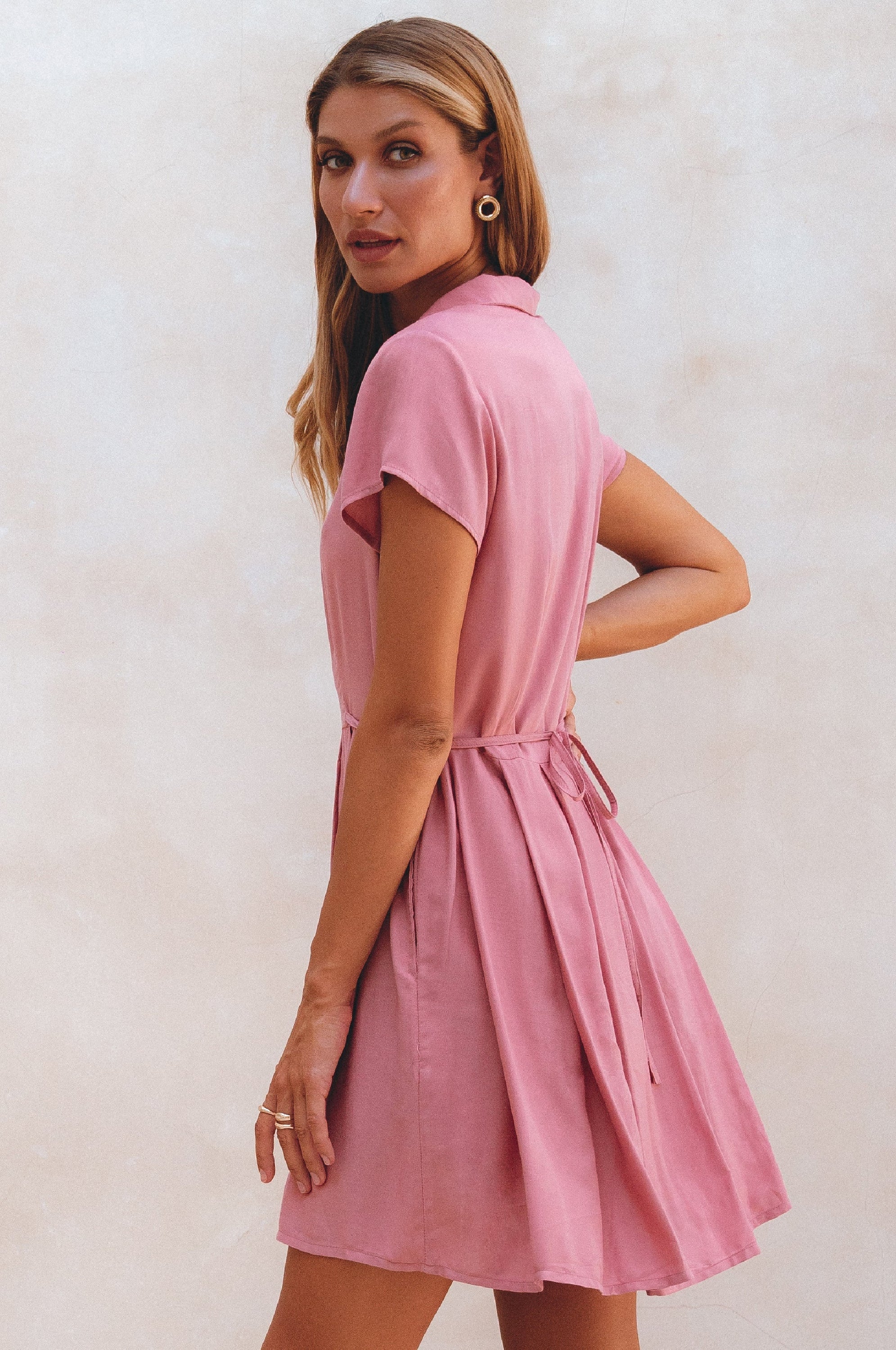 Agnes Shirt Dress featuring a button-down design, V-neckline, and self-tie waist in a breezy mini length.