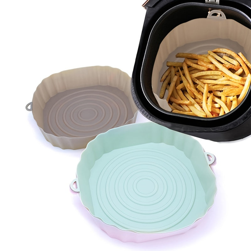 Air Fryer Usable Silicone Liner in oval shape, made of durable silicone material, designed for easy cooking and cleanup.