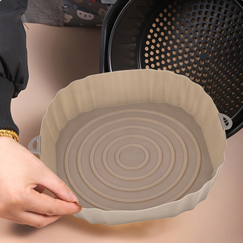 Air Fryer Usable Silicone Liner in oval shape, made of durable silicone material, designed for easy cooking and cleanup.