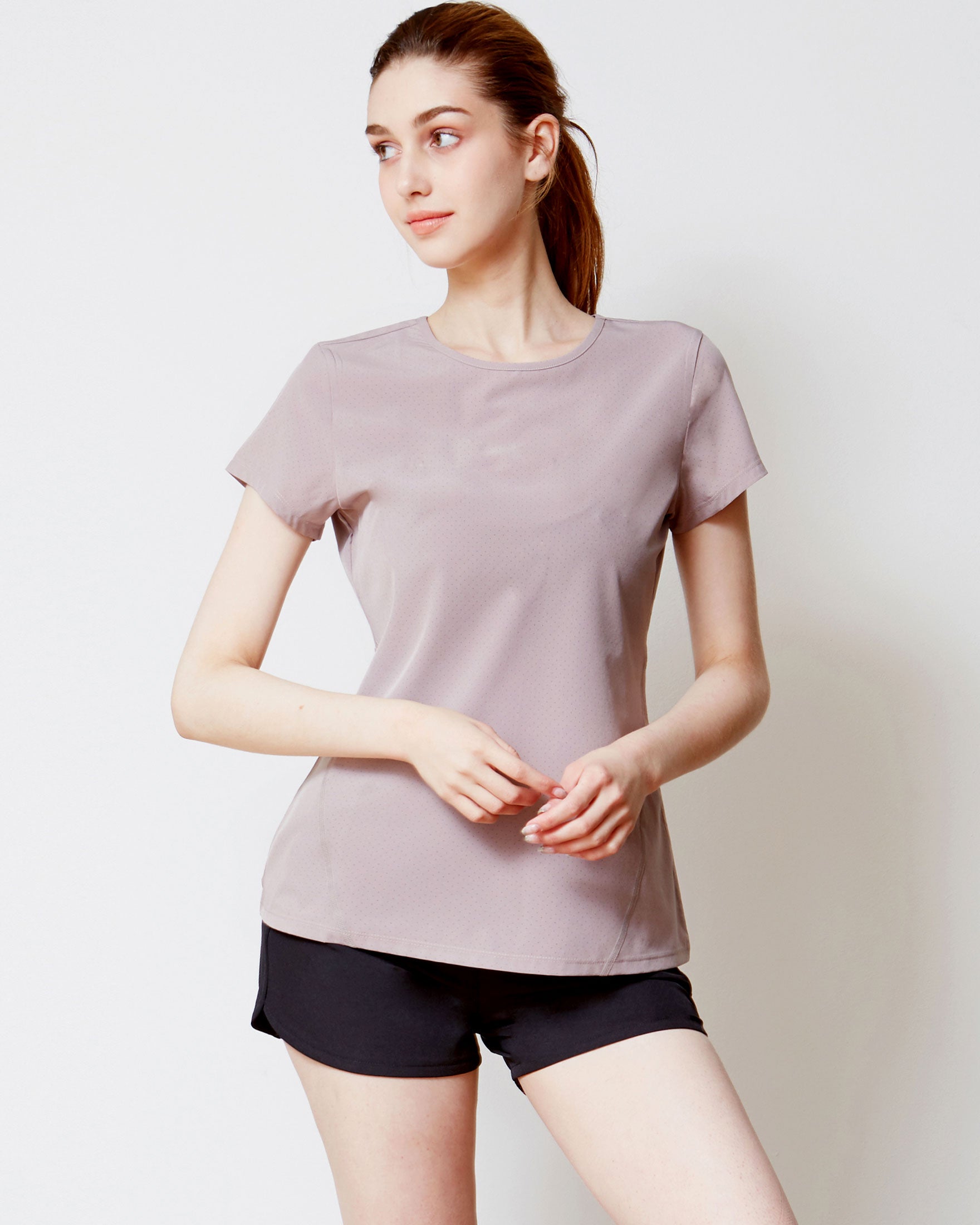 Airy Mile Laser Cut Mesh Top featuring breathable mesh design and short sleeves, ideal for workouts and hot weather.