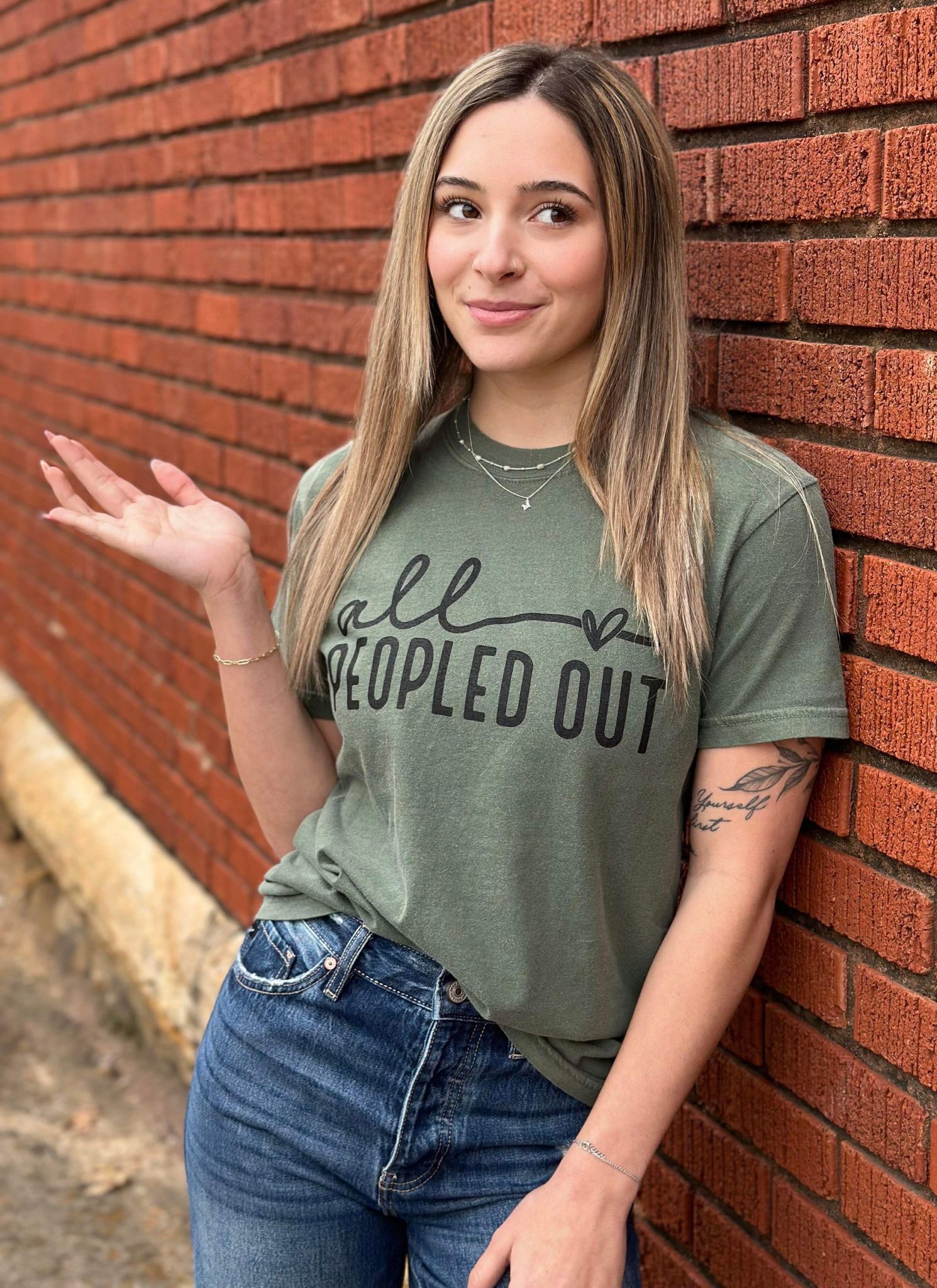 All Peopled Out Tee in Moss color, showcasing a cozy unisex design made from 100% cotton, perfect for casual wear.