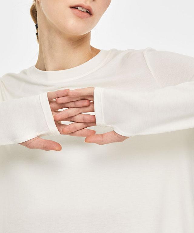 All The Time Long Sleeves featuring a soft-touch fabric, elegant fingerling sleeve design, and cool cutout details on the back.