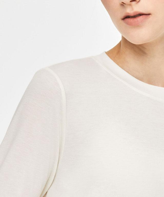 All The Time Long Sleeves featuring a soft-touch fabric, elegant fingerling sleeve design, and cool cutout details on the back.