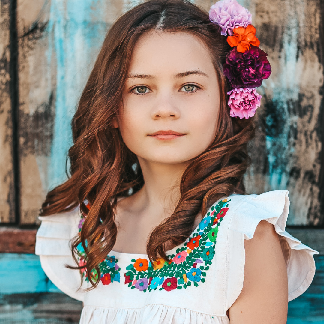 Allegra Sundress featuring flutter sleeves and multicolor hand embroidery on organic cotton fabric.