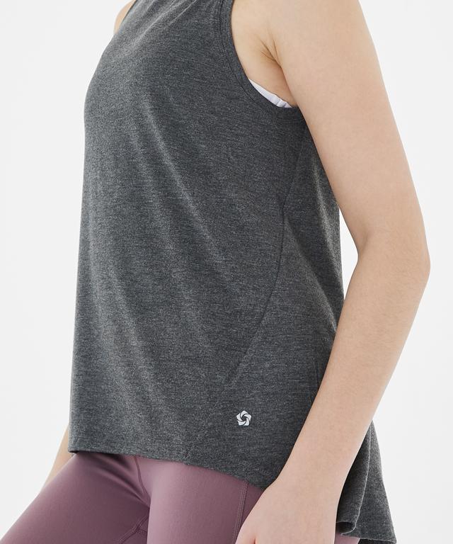 Allegro Tank featuring a stylish half-neck design and unbalanced length for body line concealment.